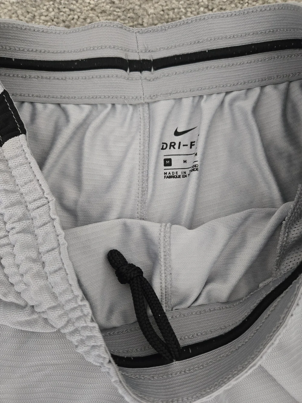 Nike Light Gray Athletic Shorts with Black Side Panels